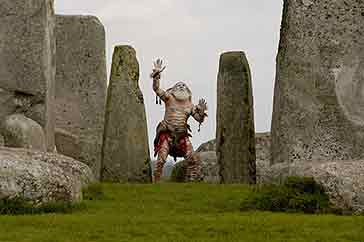 Francis in a dramatic pose at Stonehenge