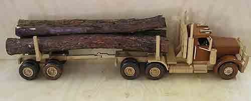 Side view of logging truck. Wooden model